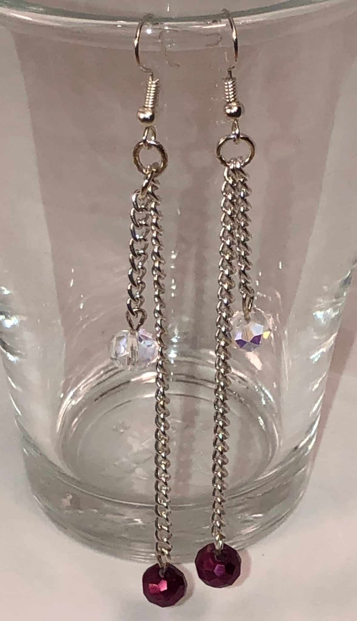 Stylish amethyst & clear crystals on antique chain drops.