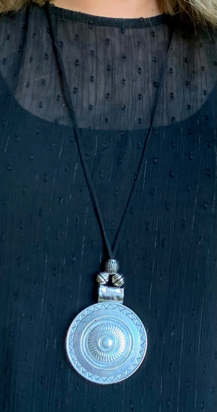 Round silver pendant