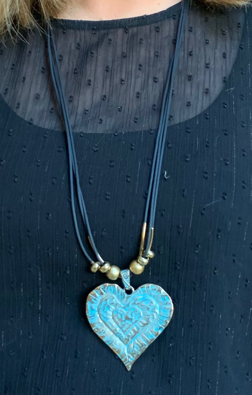Aged gold heart pendant