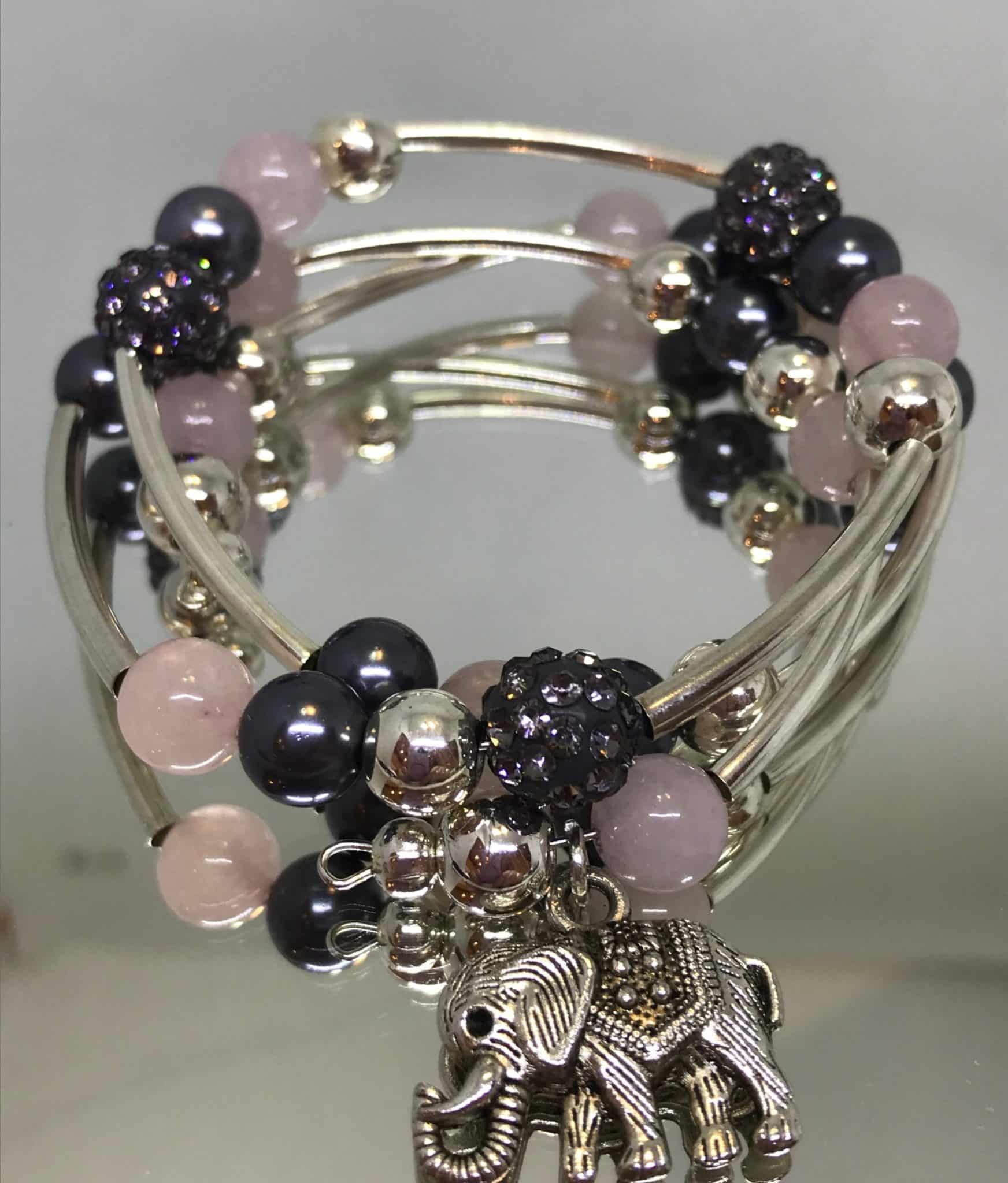 Silver plated rose quartz wraparound bracelet.