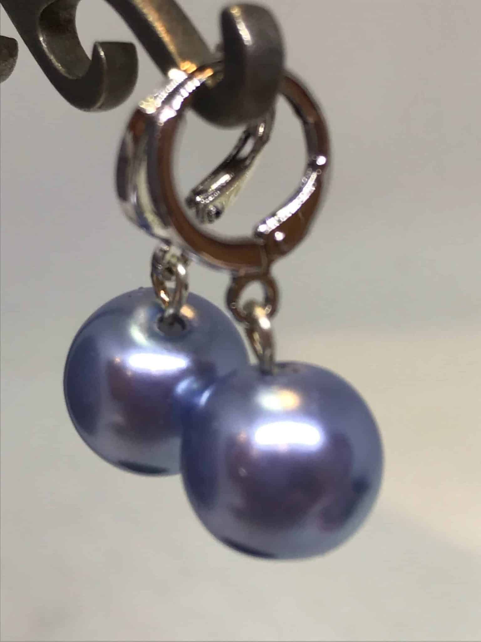 Cornflower blue pearl earrings.
