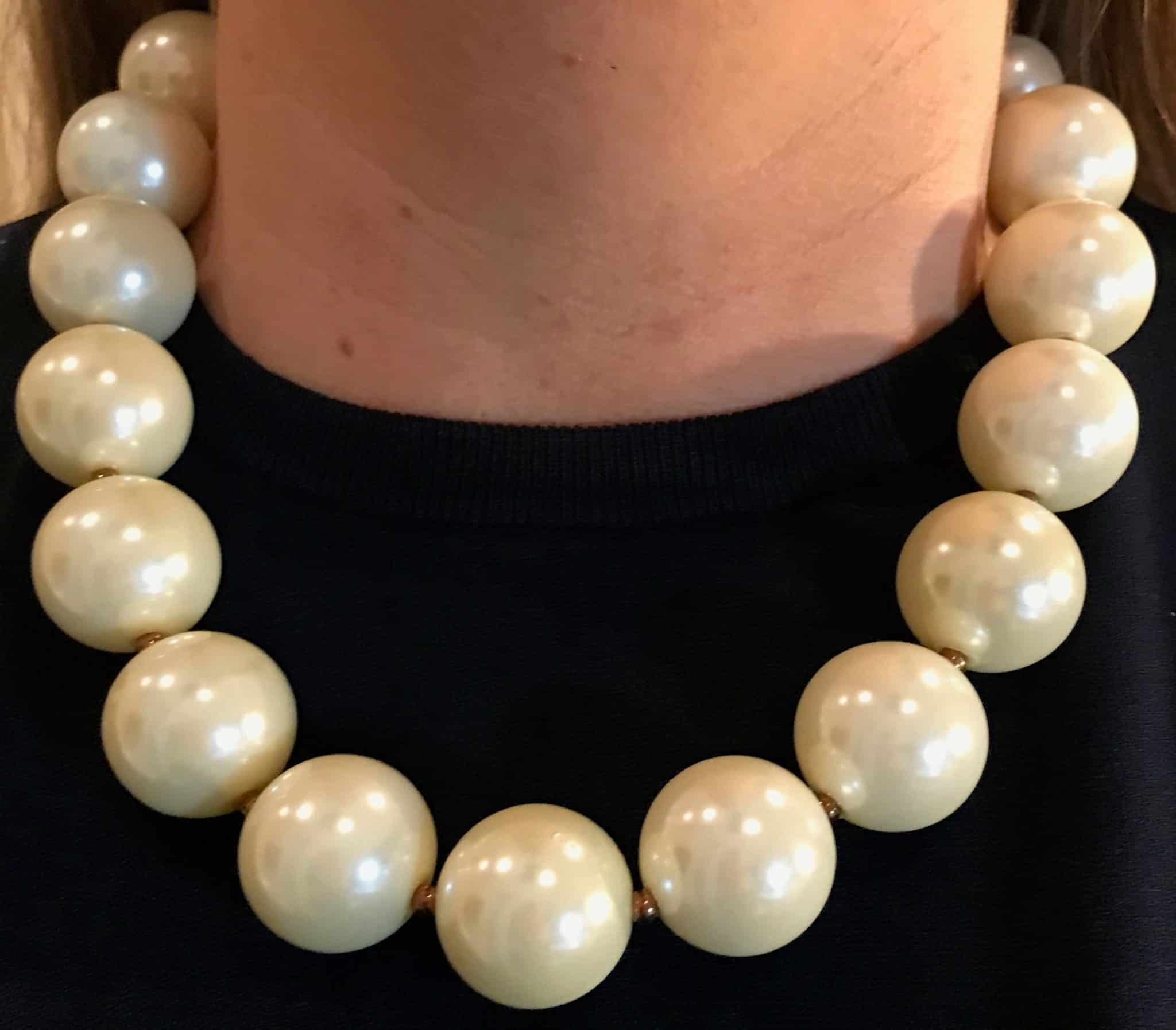 Large cream pearl necklace.